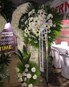 Elegant white floral arrangement for expressing condolences